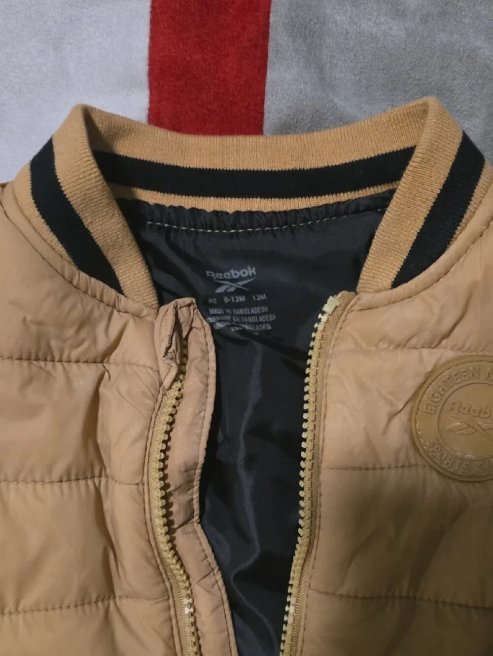Reebok Kids Quilted Vest in Tan with Black Trim